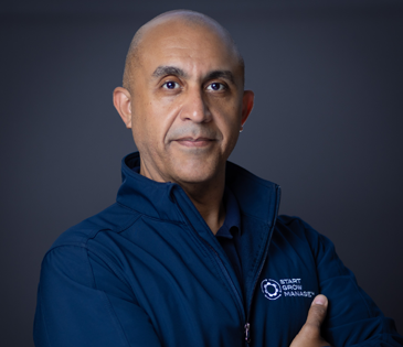 male, blue pull over jacket