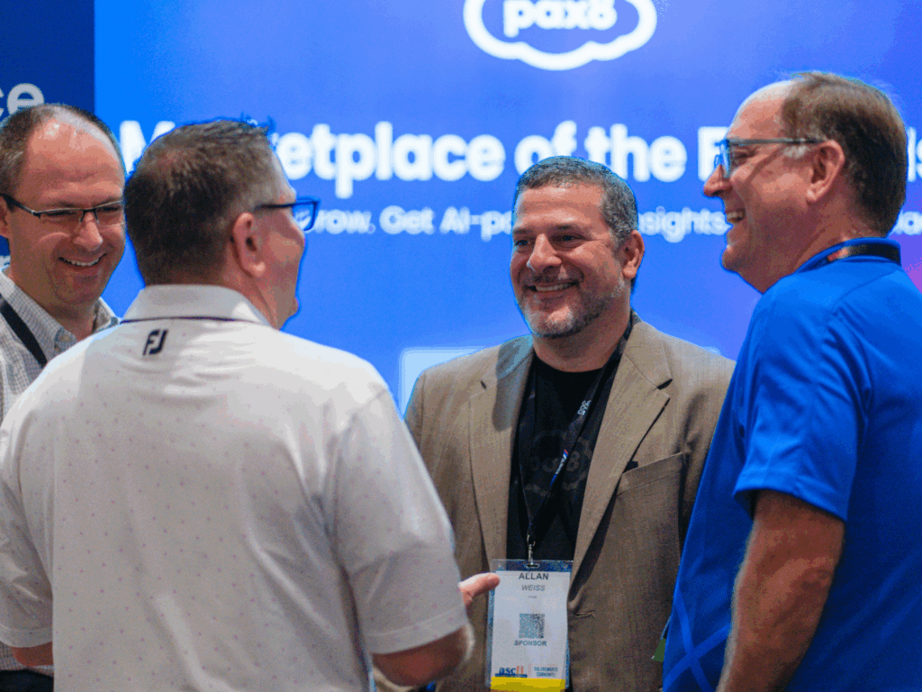 pax8-solutions-pavilion-toronto-edge-2025-smiling-attendees-scaled