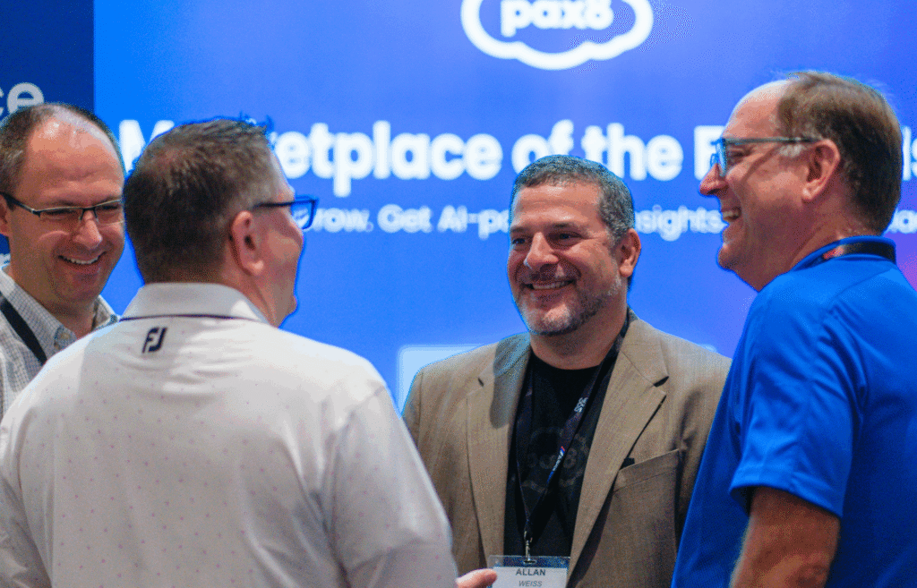 pax8-solutions-pavilion-toronto-edge-2025-smiling-attendees-scaled